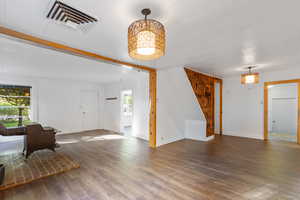 Entrance foyer featuring LVP / wood-style floors and plenty of natural light