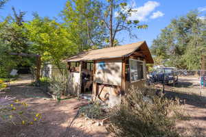 View of outdoor structure - Chicken/potting shed (has electricity)