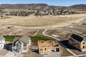 Drone / aerial view featuring a mountain view