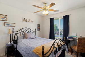 Bedroom with carpet floors and ceiling fan