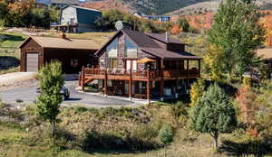 View of Home and Garage