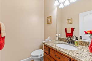 Bathroom with vanity and toilet