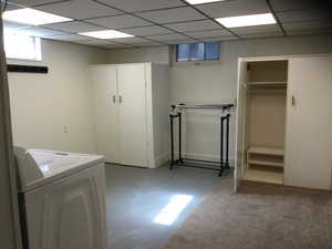 Clothes washing area with washer / dryer