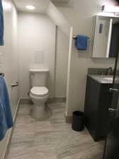 Bathroom with vanity and toilet