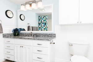 Bathroom with vanity and toilet