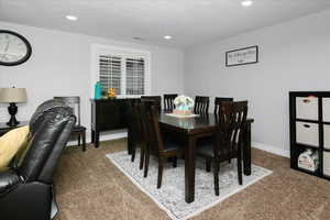 View of carpeted dining room