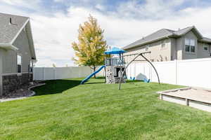 View of yard with a playground