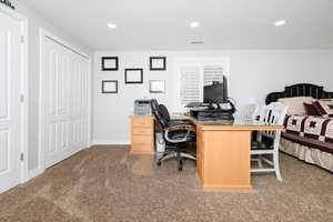 Home office featuring carpet flooring