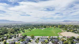 Birds eye view of property featuring a mountain view