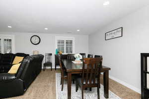 View of carpeted dining room