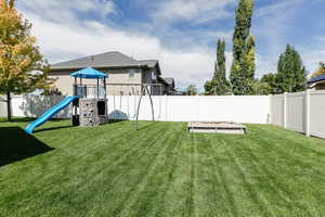 View of yard featuring a playground