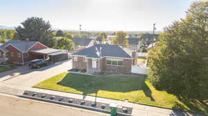 View of front of home featuring a front lawn