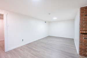 Spare room featuring light hardwood / wood-style floors