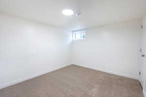 View of carpeted spare room