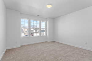 Spare room with light carpet