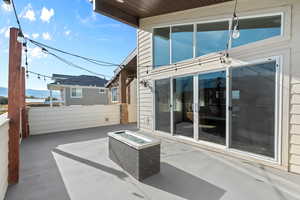 View of patio / terrace featuring an outdoor fire pit