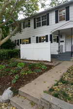 View of front of house with covered porch