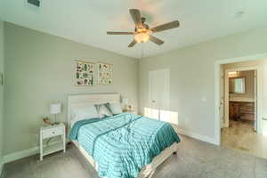 Bedroom featuring carpet floors and ceiling fan