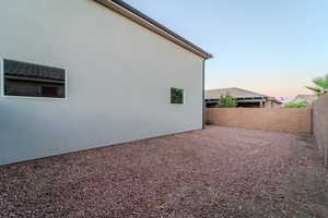 View of property exterior at dusk