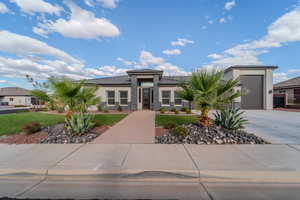 View of front of home featuring a garage