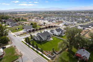 Birds eye view of property with a mountain view