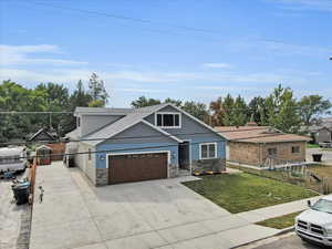 View of front of home with a front yard