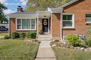 View of front of house with a front yard