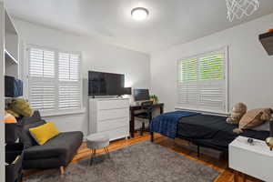 Bedroom featuring hardwood / wood-style floors