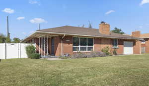 Front view with attached single car garage