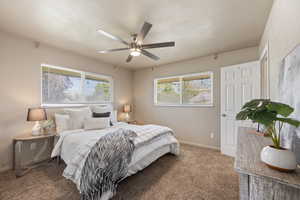 Bedroom featuring carpet floors and ceiling fan