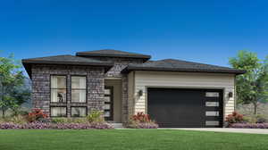 View of front of property with a front yard and a garage. Prairie elevation (colors may vary)