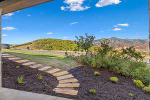 View of yard with a mountain view