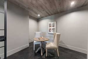 Dining space featuring wooden ceiling