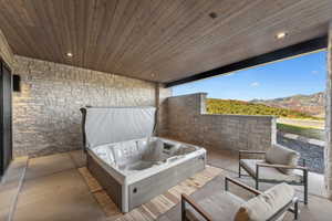 View of patio / terrace with a mountain view and an outdoor hangout area