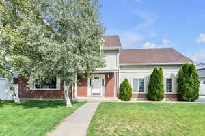 View of front of home with a front yard