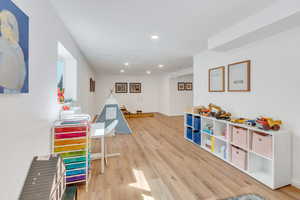 Family recreation room with light LVP flooring