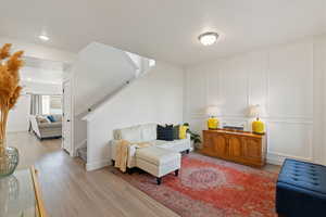 Sitting room featuring light hardwood / wood-style floors