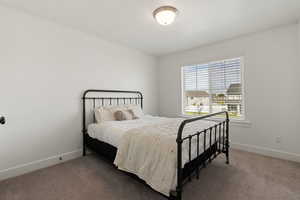 Bedroom featuring carpet