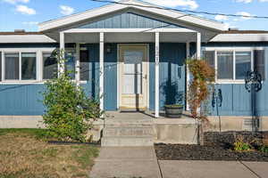 Entrance to property with covered porch