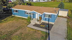 View of front of property featuring a front yard