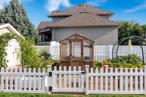 Garden with green house and storage shed