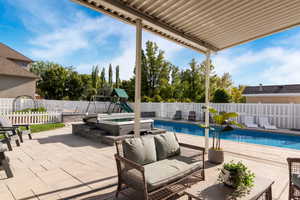 Swimming pool with hot tub