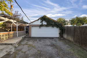 2 car garage and outdoor patio area