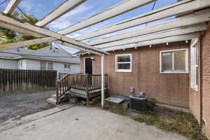 Laundry room on the right (south of window) & AC unit