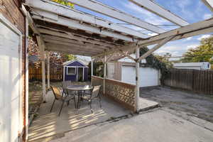 Outdoor entertaining space & laundry room door on the left