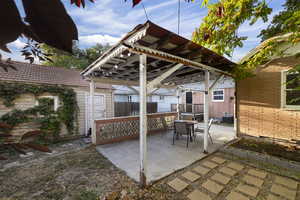 Outdoor entertaining space and garden box.