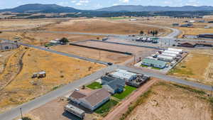 Drone / aerial view with a mountain view and a rural view