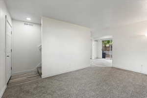 Unfurnished living room with light wood-type flooring