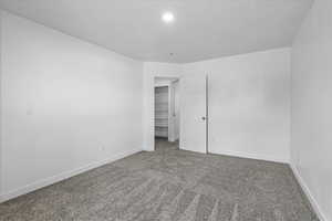 Empty room with carpet flooring