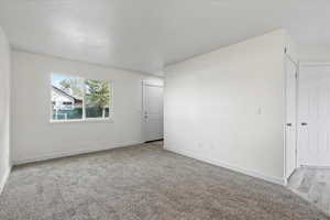 View of carpeted spare room